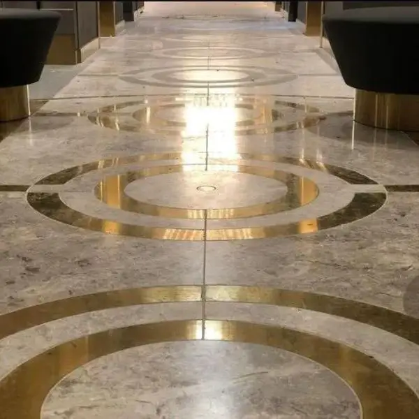 Concrete with Brass Inlays for a Luxe Look