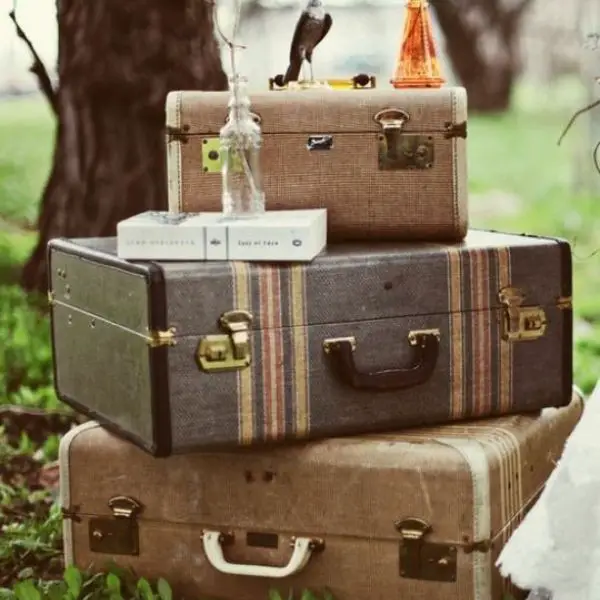  Include a Vintage Suitcase Stack