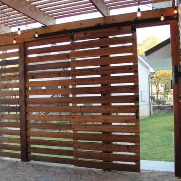  Install a Pergola with Sliding Panels for Privacy