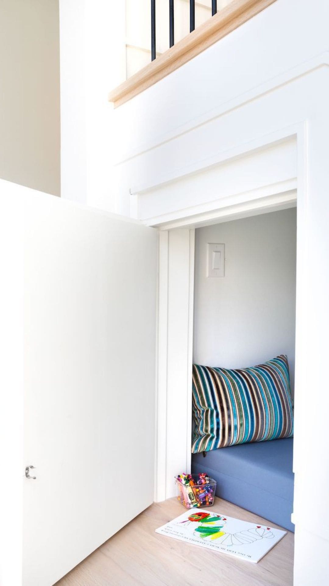 Use Space Under Stairs as a Secret Reading Nook