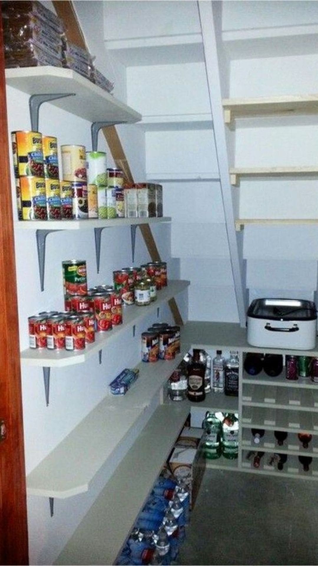 Utilize Space Under the Stairs for a Hidden Pantry